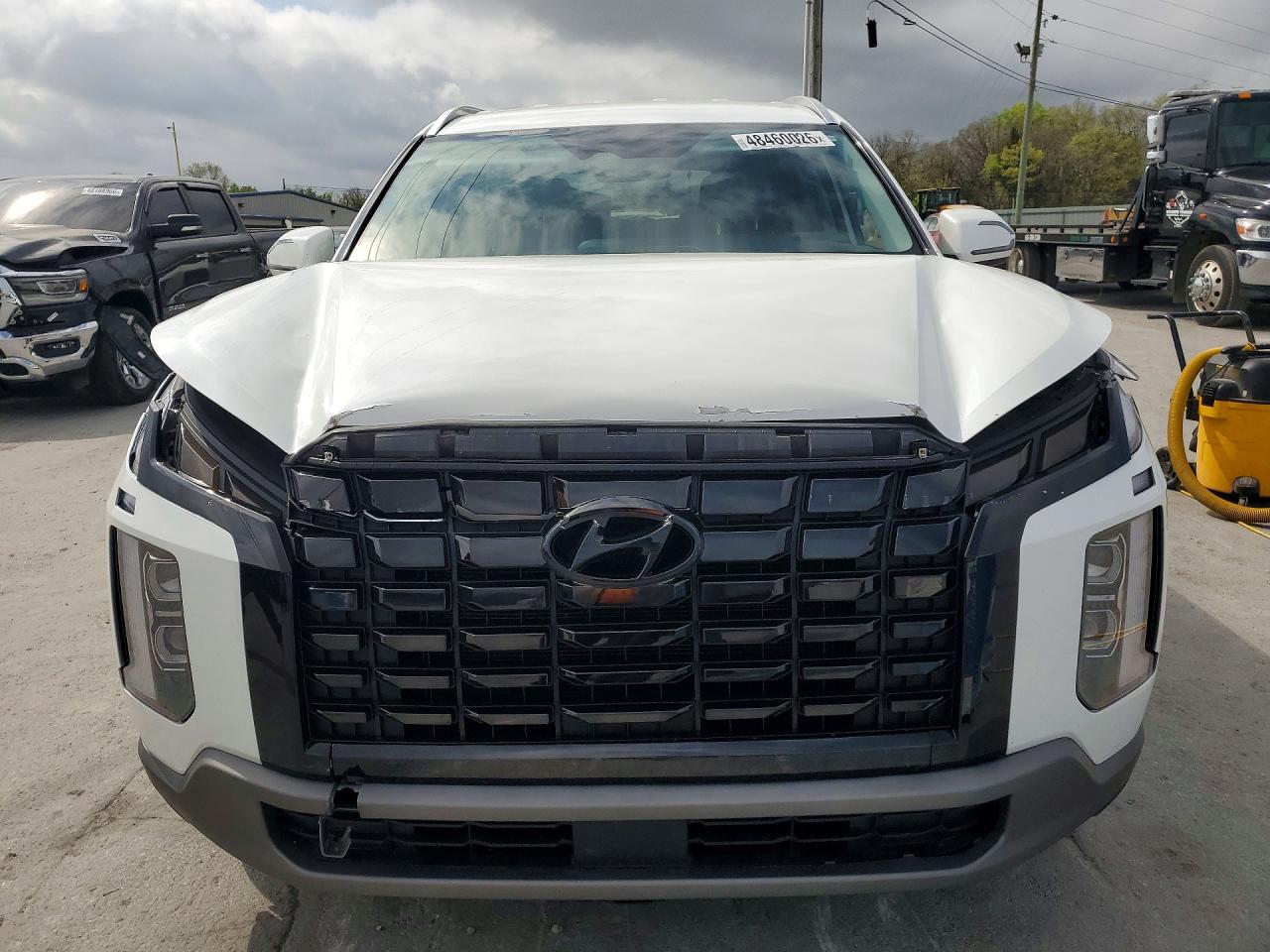 White SUV front damage view
