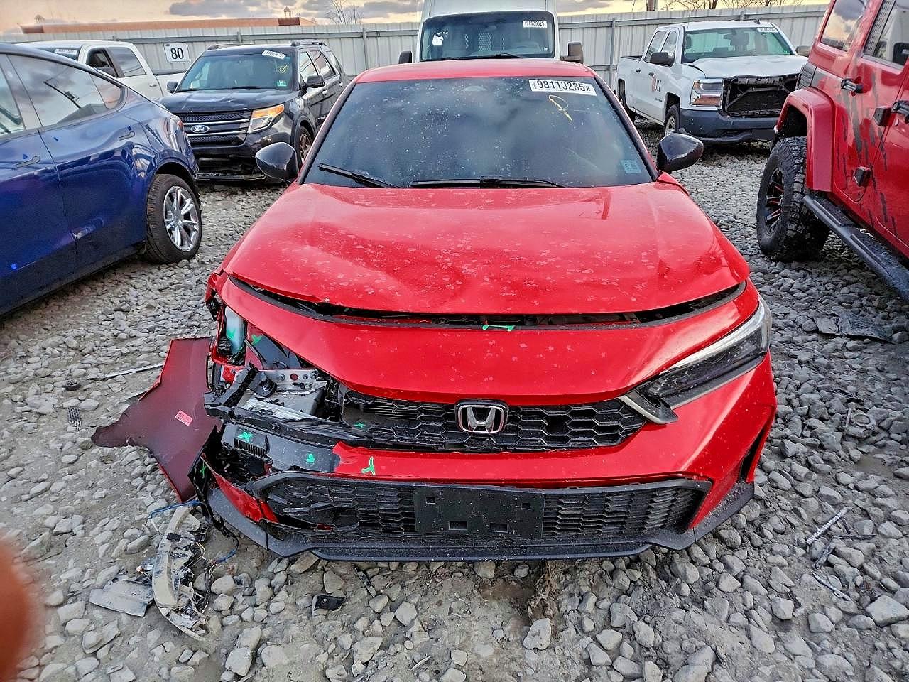 Red Honda Civic front collision damage